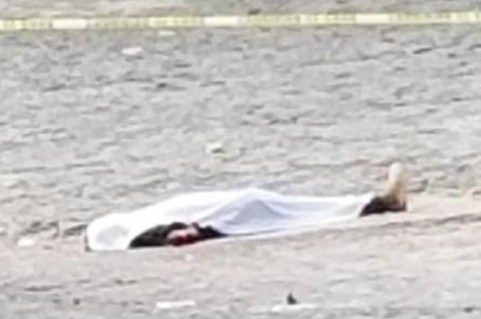 Localizan tirado sobre la calle a un hombre que presentaba impactos de bala