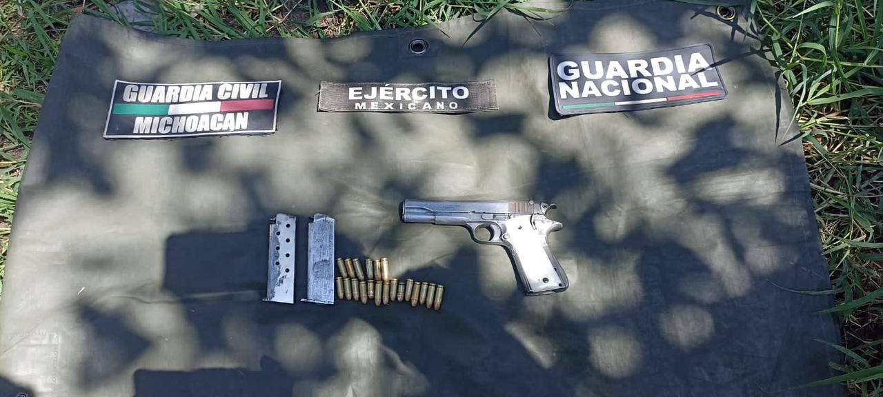 A través de la BOI: Guardia Civil, Sedena y GN aseguran a uno con arma y municiones, en Uruapan.