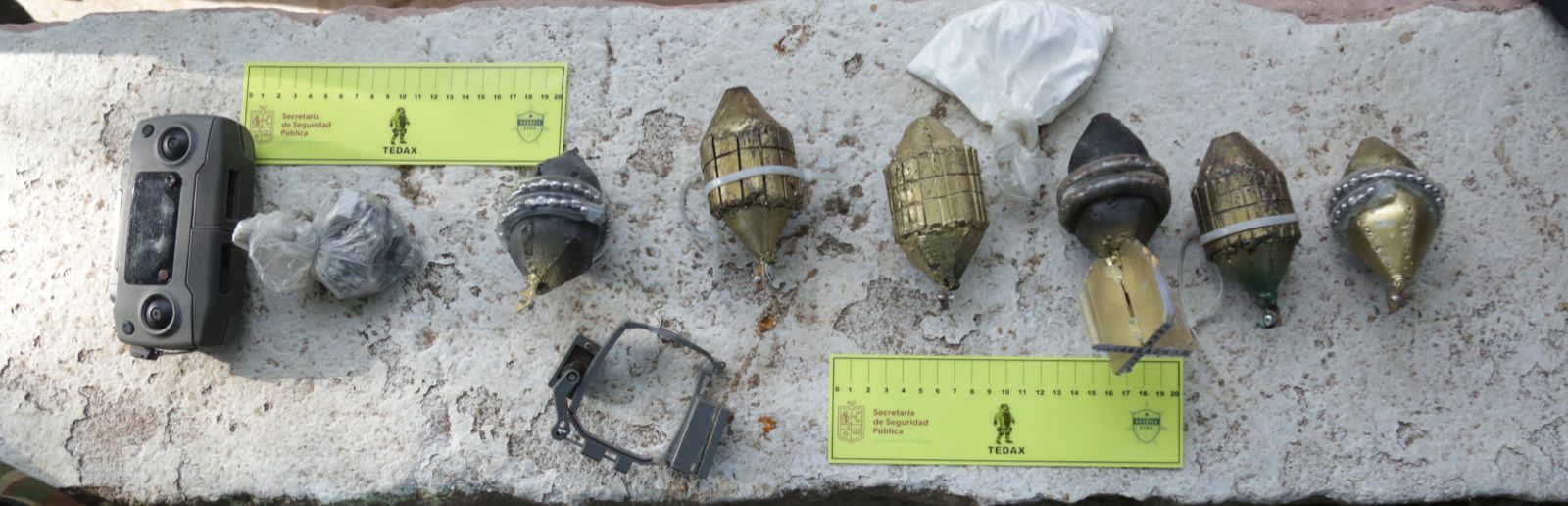 SSP, Sedena y GN aseguran seis explosivos para drones y cientos de cartuchos útiles, en La Ruana.
